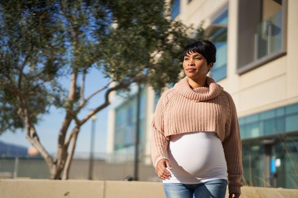 Pregnant woman outside of hospital